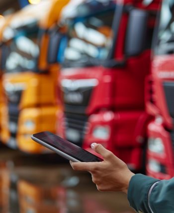 Business owner reviewing a commercial car insurance policy